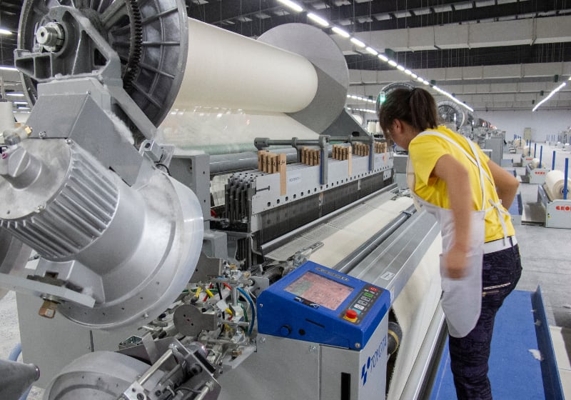 Female worker in Chinese textile mill