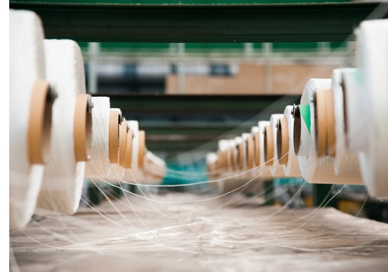 Recycled polyester yarns on spools