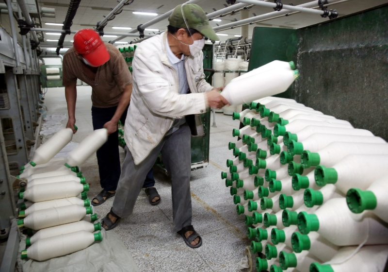 Chinese textile suppliers handling coned yarn
