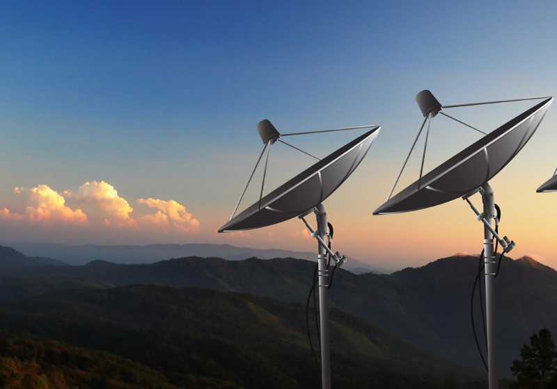 Images of satellite dishes receiving data.